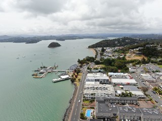 Paihia, Bay of Islands / New Zealand - December 16, 2019: The Scenic Seaside Village of Paihia at the Bay of Islands