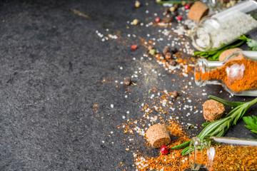 Cooking food background with herbs, olive oil and spices