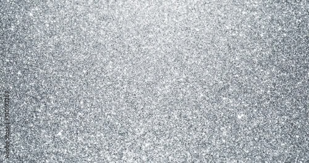 Aufkleber silver glitter background, sparkling shimmer glow particles texture. silver light sparks and glitter
