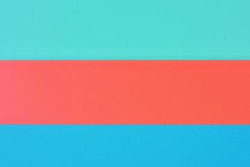 Three tone paper background lush lava, phantom blue and aqua menthe color. Blank colorful backdrop with empty space for image or text. Mockup concept. Color block red, blue, green empty backdrop 