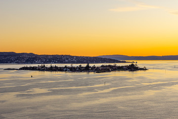 Oslofjord and Oslo cityscape at sunset, Norway