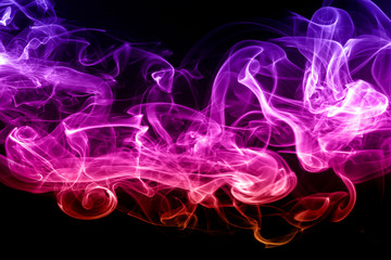 Abstract colorful smoke on black background. dense smoke, fire design