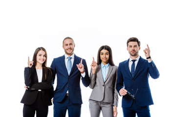 multicultural business people in suits pointing with fingers up isolated on white