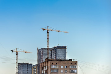 Construction of apartment houses in the residential district of city	