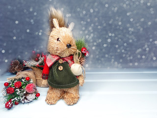 winter background with squirrel decor and garland lights