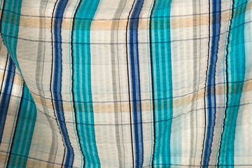 Tartan cloth fabric texture background.