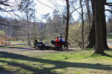 Resting people in the spring park 