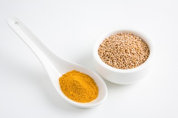 Turmeric Powder And Mustard Seed In Bowl