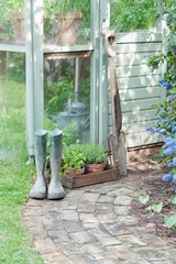 Garden Tools And Wellington Boots