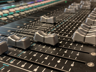 Musical control panel with sliders. Analog sound mixer or console. Remote control musical...