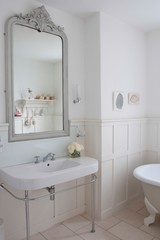 Obraz na płótnie Canvas Mirror Above Bathroom Sink