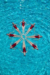 Synchronised Swimmers Forming A Circle
