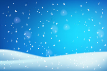 Fototapeta premium Winter christmas white blue Snowdrifts blurred background with shiny snow and blizzard.