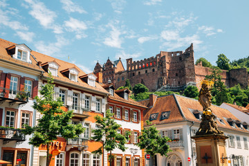 Old town Kornmarkt square and Heidelberg castle in Heidelberg, Germany