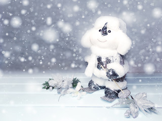 winter background with snowman decor and snow