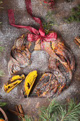 pumpkin chocolate babka with cinnamon and powdered sugar