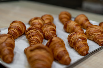 Freshly baked croissants in a pastry shop in Madrid, Spain