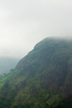 Misty mountain in the distance - Kurangani Hills, Tamil Nadu, India