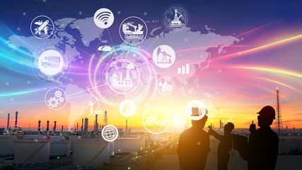 Silhouette of the engineering team is working at the oil refinery and icons connecting networking using industry concept