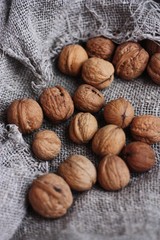 Walnuts on a grey linen background macro 