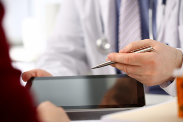 Female doctor hands hold and show digital