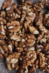 Walnuts on a grey linen background macro 