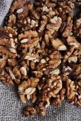 Walnuts on a grey linen background macro 