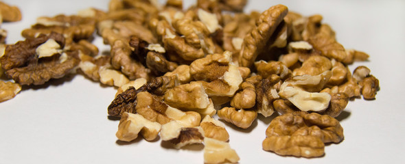 Walnuts on a white background.