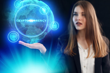 Business, Technology, Internet and network concept. Young businessman working on a virtual screen of the future and sees the inscription: Cryptocurrency