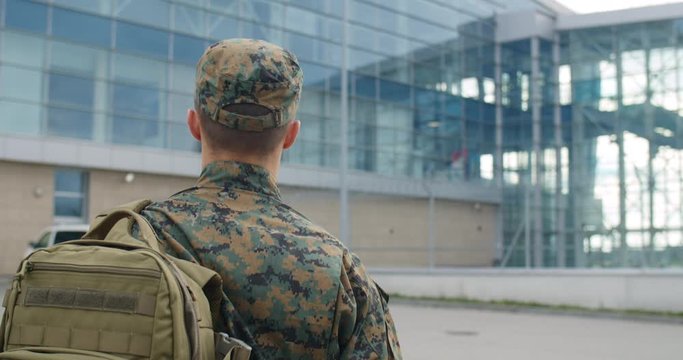 Back view of male soldier.