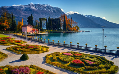 Beautiful and colorful autumn in Riva del Garda, Garda lake surrounded by mountains, Trentino Alto...