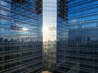 Reflection on a glass facade of office building