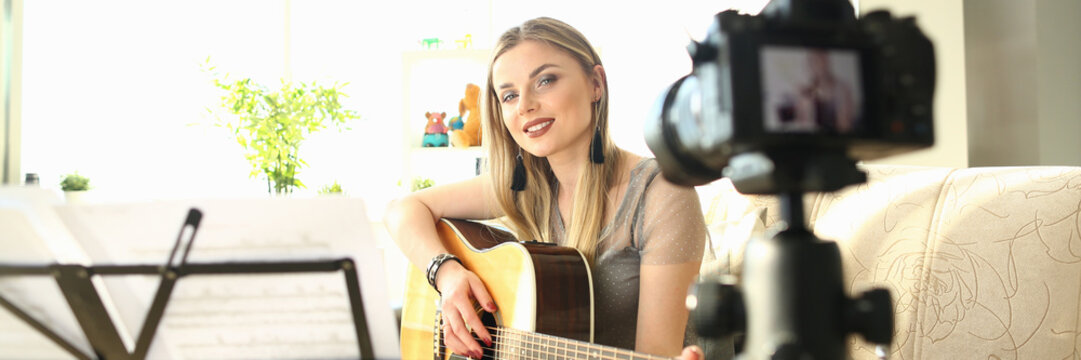 Female Blogger Creating Art Musical Vlog Content