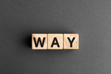 way - acronym from wooden blocks with letters, Where Are You abbreviation way concept, gray background