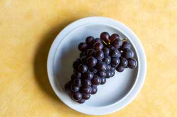 grapes in a glass bowl
