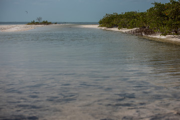 Isla Blanca, a two-hour drive from Cancun, is breathtaking in its beauty. Its laid-back, casual vibe make it a quiet place to relax, eat, play, and absorb the peaceful lagoon and ocean views