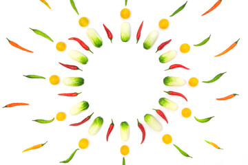 Top view flat lay over cucumbers, cherry tomatoes and peppers on a white background with copy space. Food template food design menu background with culinary ingredients