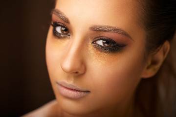 Fototapeta premium beautiful young sexy girl with bright makeup with clean skin and tight lips