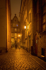Fototapeta na wymiar Dziana Street at night in Old Town of Gdansk. Poland, Europe