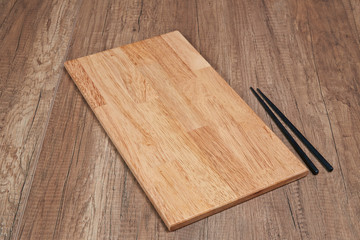 Elegant wooden tray on textured table