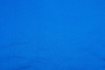 Background with blue fabric texture.