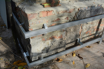 Residential house foundation wall repair and renovation  with installing steel sheets for...