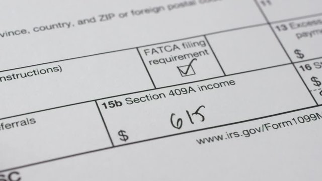 Tax reporting. Human fills out the 1099-misc tax form. Macro video