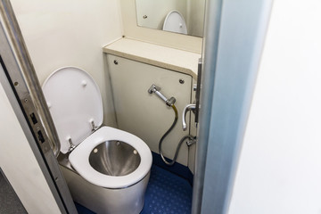 Interior of the clean empty toilet on the Thai train or railway.