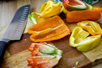 sliced bell pepper on a wooden cutting board