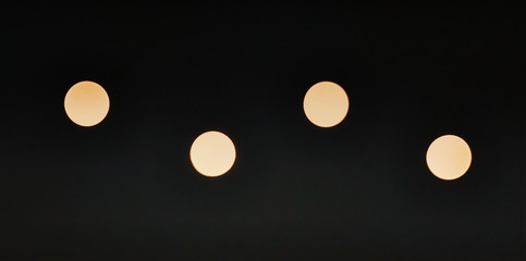 Bright lights on a black background.