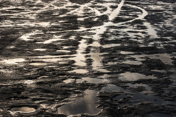Nice contrast of texture and light of the flooded ground in 