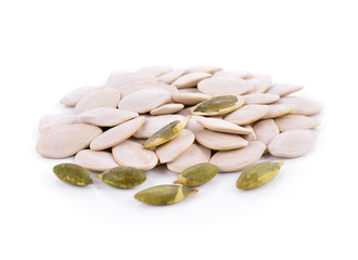 Pumpkin seeds on a white background