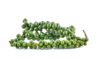 green peppercorns on white background