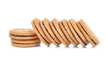Sandwich cookie filled with chocolate cream on white